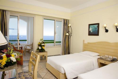 12 фото отеля Coral Beach Resort Tiran 4* 