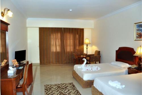 10 фото отеля Coral Hills Resort Marsa Alam 5* 