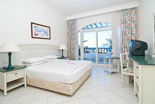 11 фото отеля Poinciana Sharm Resort 4* 