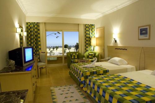 11 фото отеля Solitaire Resort Marsa Alam 4* 