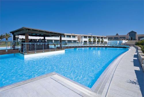 59 фото отеля Cavo Spada Sports & Leisure Resort 5* 
