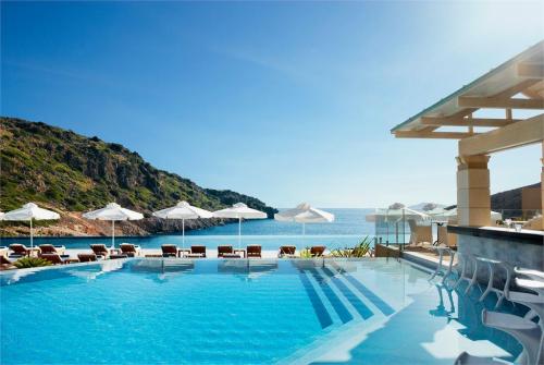 11 фото отеля Daios Cove Luxury Resort & Villas 5* 