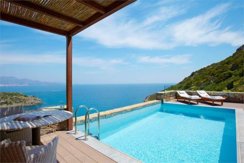23 фото отеля Daios Cove Luxury Resort & Villas 5* 