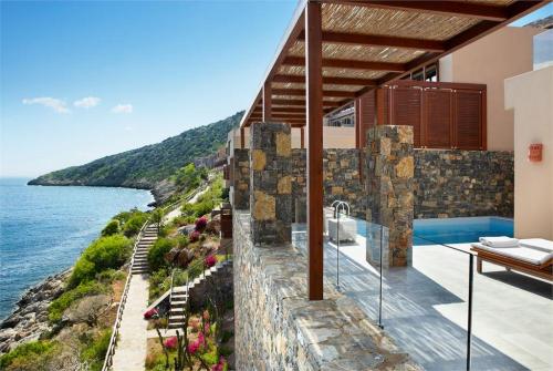 25 фото отеля Daios Cove Luxury Resort & Villas 5* 