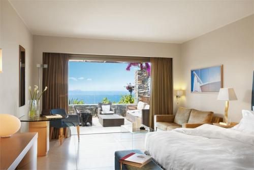 32 фото отеля Daios Cove Luxury Resort & Villas 5* 
