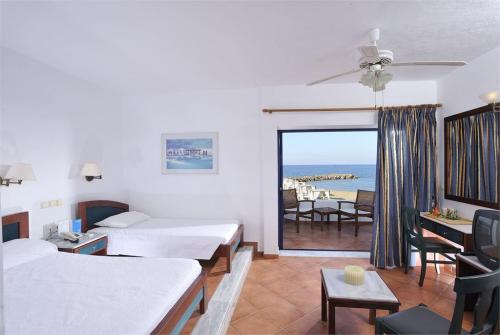 21 фото отеля Knossos Beach Bungalows & Suites 4* 
