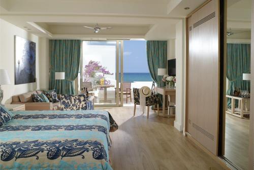 40 фото отеля Knossos Beach Bungalows & Suites 4* 
