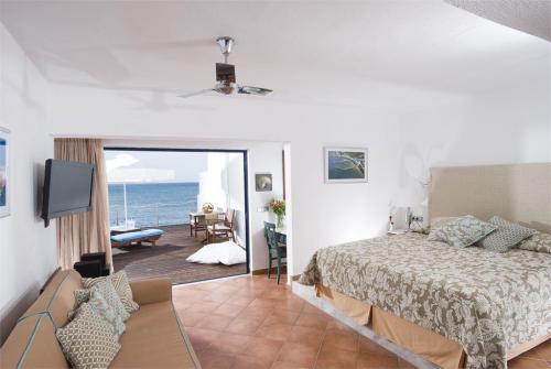 44 фото отеля Knossos Beach Bungalows & Suites 4* 
