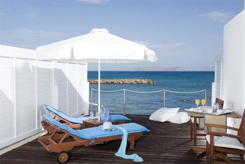 45 фото отеля Knossos Beach Bungalows & Suites 4* 