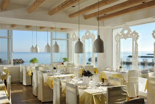 53 фото отеля Knossos Beach Bungalows & Suites 4* 