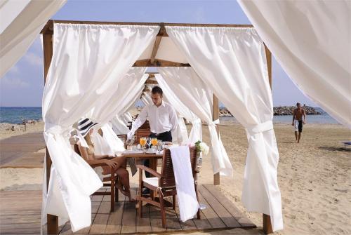 55 фото отеля Knossos Beach Bungalows & Suites 4* 