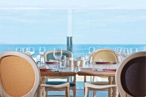 56 фото отеля Knossos Beach Bungalows & Suites 4* 