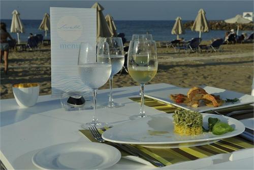 58 фото отеля Knossos Beach Bungalows & Suites 4* 