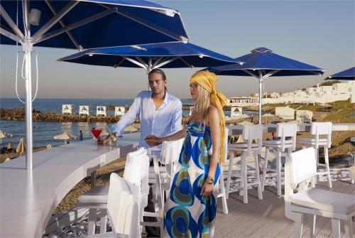 66 фото отеля Knossos Beach Bungalows & Suites 4* 