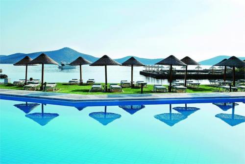 4 фото отеля Porto Elounda Golf & Spa Resort 5* 