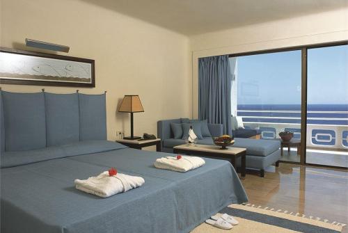 30 фото отеля Sensimar Minos Palace Hotel & Suites 5* 