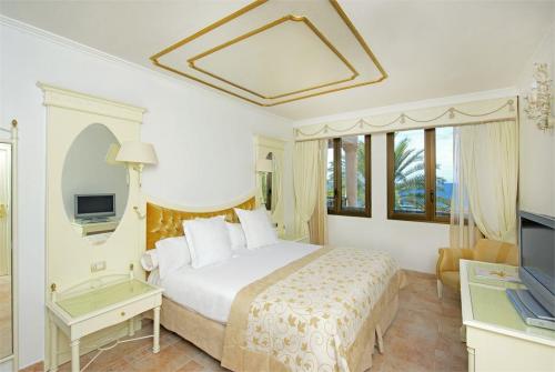 7 фото отеля Iberostar Grand Hotel Salome 5* 