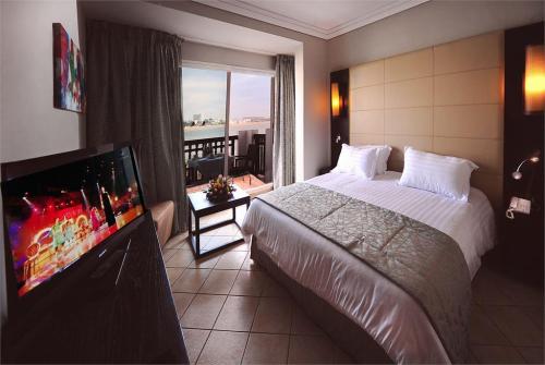 7 фото отеля Atlas Marina Beach Suites & Spa Hotel 5* 