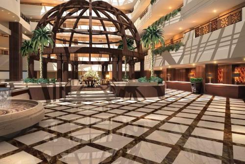 4 фото отеля Al Bustan Rotana 5* 