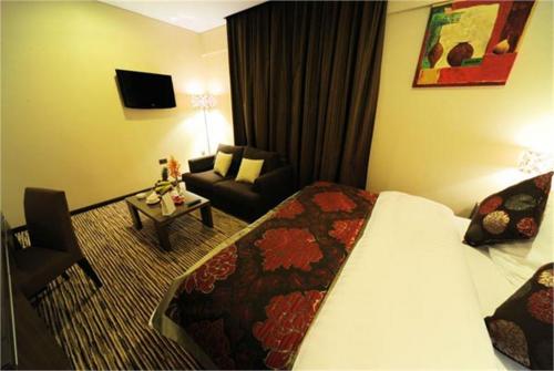 10 фото отеля Alhamra Hotel Sharjah 4* 
