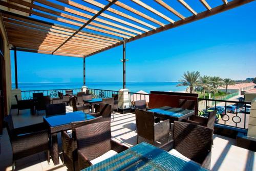 22 фото отеля Barracuda Beach Resort Umm Al Quwain 3* 