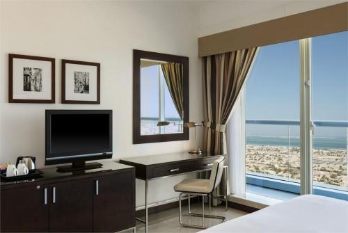 14 фото отеля Four Points Sheikh Zayed Road Hotel 4* 