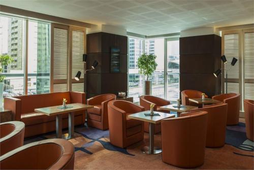 22 фото отеля Four Points Sheikh Zayed Road Hotel 4* 