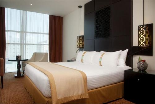 15 фото отеля Holiday Inn Dubai Al Barsha 4* 