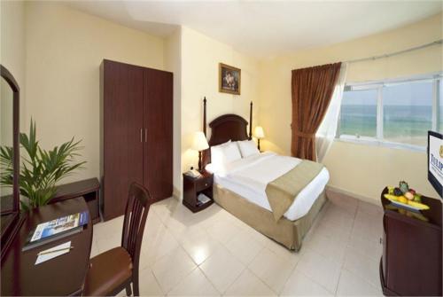 9 фото отеля Tulip Inn Royal Suite Ajman апарт 