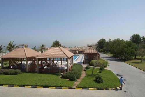 4 фото отеля Umm Al Quwain Beach 3* 