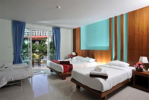 15 фото отеля Baan Karon Resort 3* 