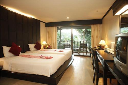8 фото отеля Chanalai Garden Resort 4* 