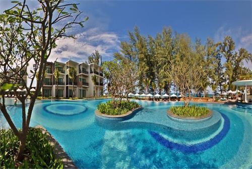 5 фото отеля Holiday Inn Resort Phuket Mai Khao Beach 5* 