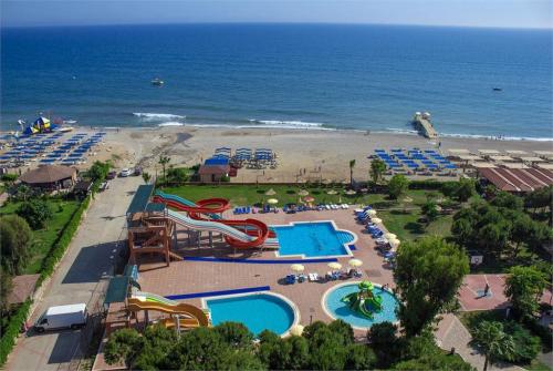 24 фото отеля Club Turtas Beach Hotel 4* 