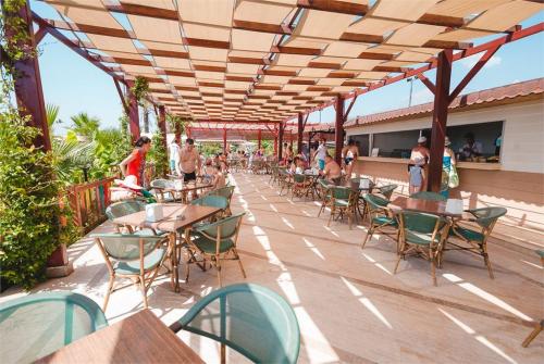29 фото отеля L'oceanica Beach Resort Hotel 5* 
